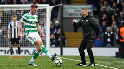 Celtic manager Martin O'Neill watches as Nick Pope kicks the ball during a Premier League match at Celtic Park in...